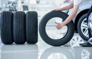 A person showing a set of four tires near Orangeburg, South Carolina.