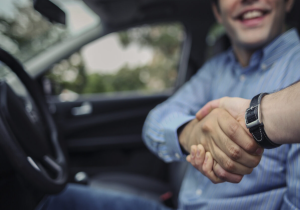 A person arriving at a dealership to buy a new car near Orangeburg, South Carolina
