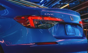 A blue 2024 Honda Civic photographed from the rear near Orangeburg, South Carolina