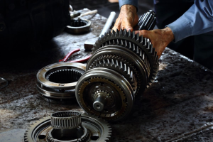 A person servicing a car's transmission near Orangeburg, South Carolina